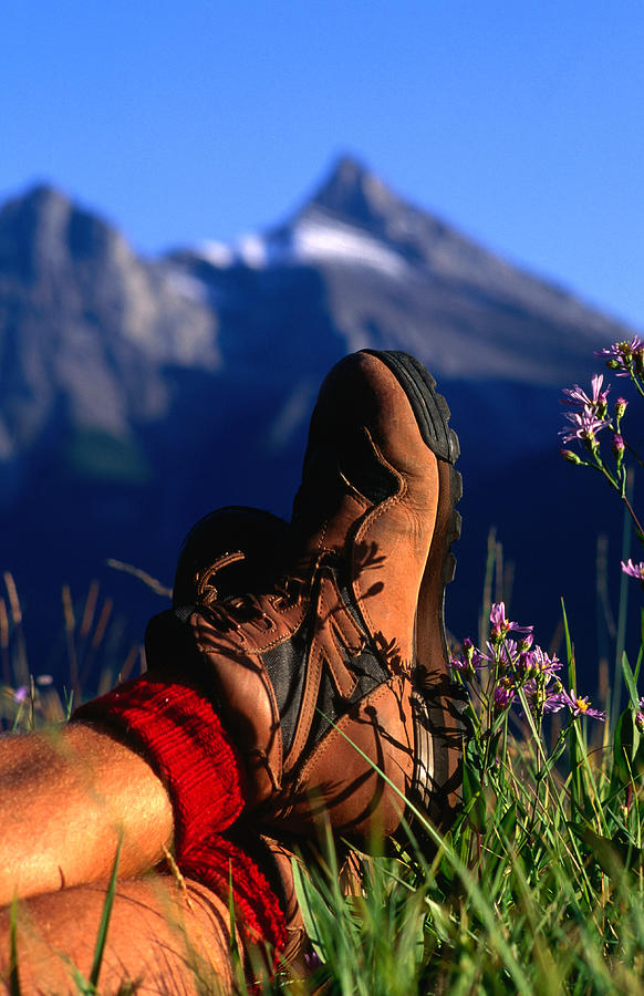 Hikers Feet On Wildflowers With Photograph by Ascent/pks Media Inc.