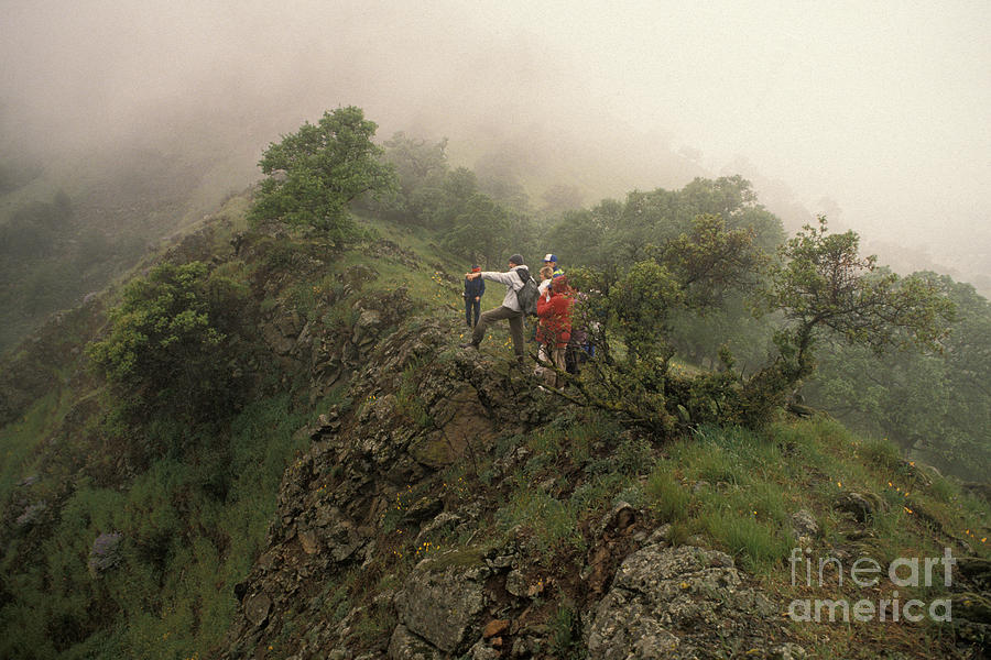 Hikers On A Foggy Mountaintop Photograph by Ron Sanford