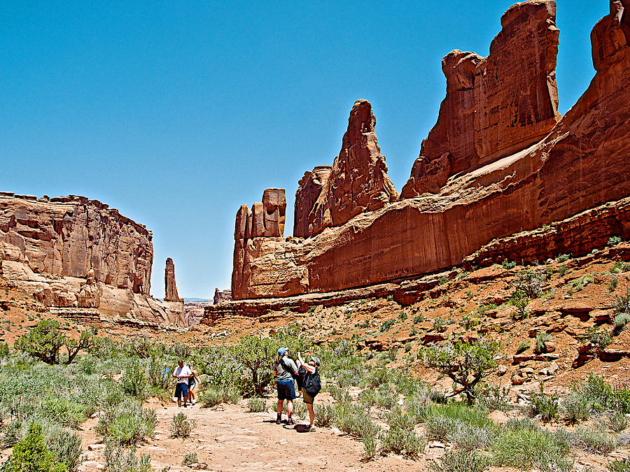 Hikers on Park Avenue Trail in Arches  National Park, Utah  Photograph by Ruth Hager