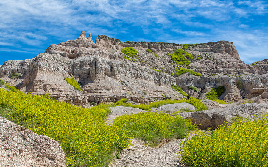 Hiking in the Badlands Photograph by John M Bailey
