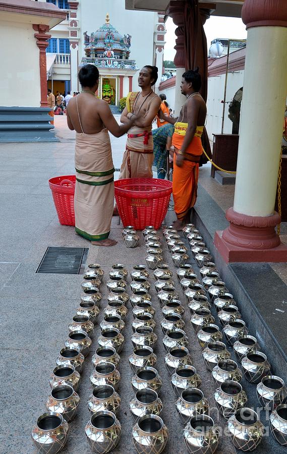 Hindu priests prepare offering to gods Photograph by Imran Ahmed