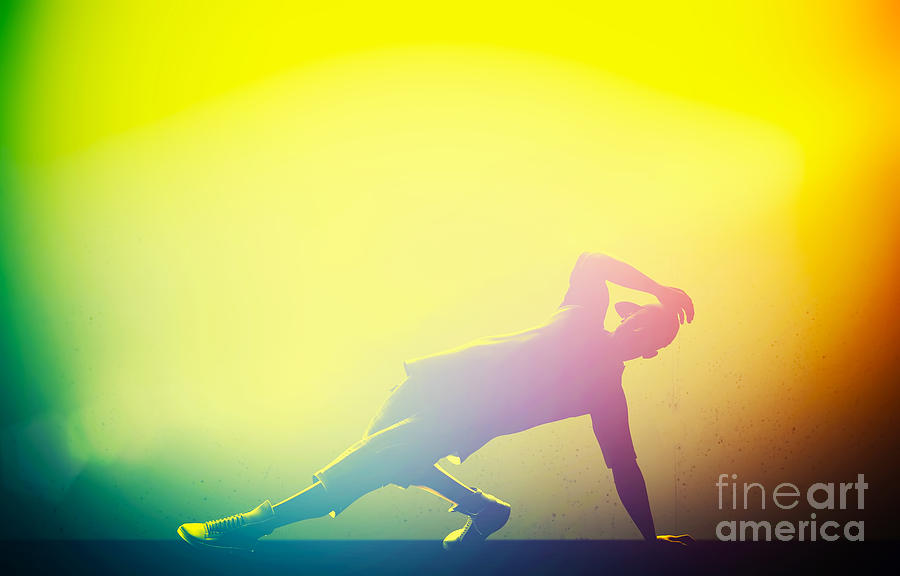 Music Photograph - Hip hop break dance performed by young man in colorful club lights by Michal Bednarek