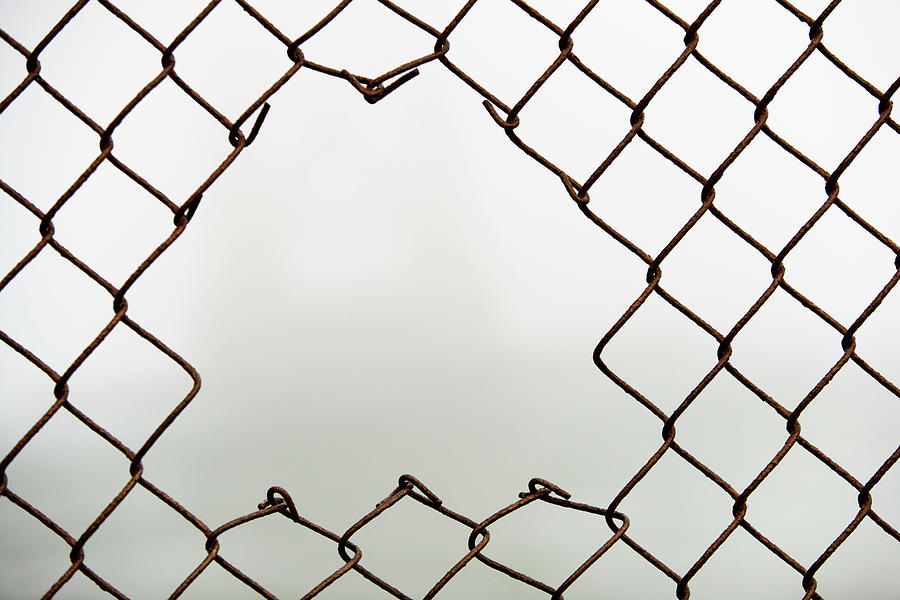 Accessibility Photograph - Hole In Chain Link Fence by Ron Koeberer