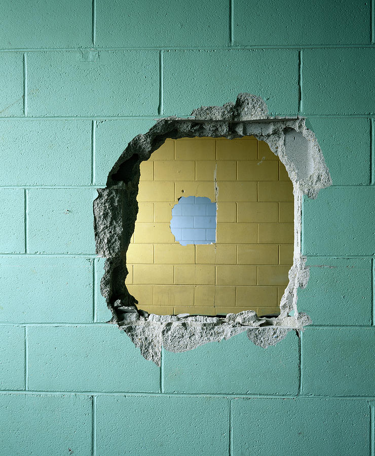 Holes in tile walls Photograph by Alex L. Fradkin