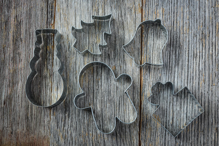 Christmas Photograph - Holiday Cookie Cutters on Rustic Wood Background by Brandon Bourdages