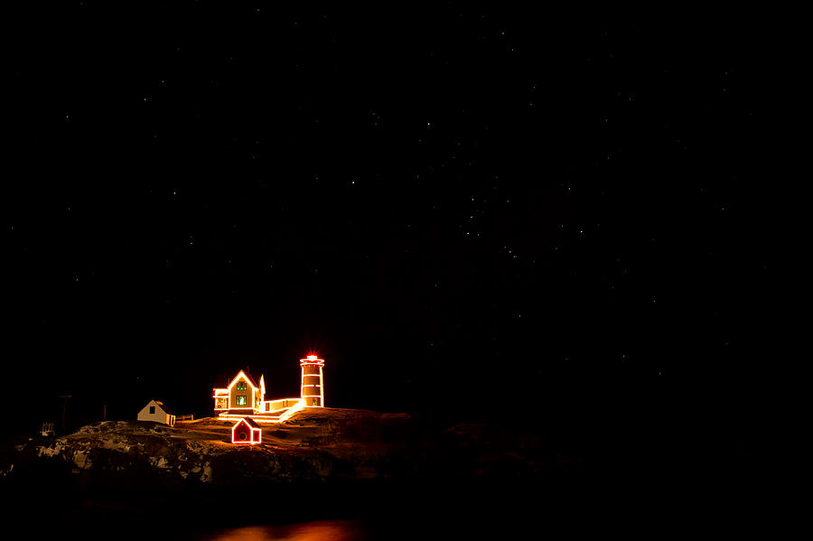 Holiday Lights At Nubble Light Photograph by Jeff Sinon