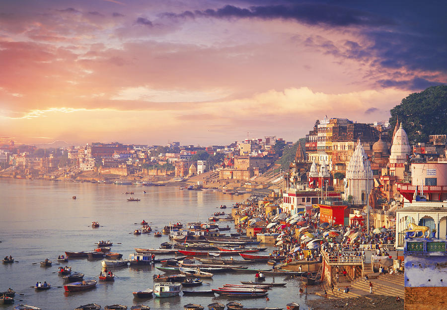 Holy town Varanasi and the river Ganges Photograph by Narvikk