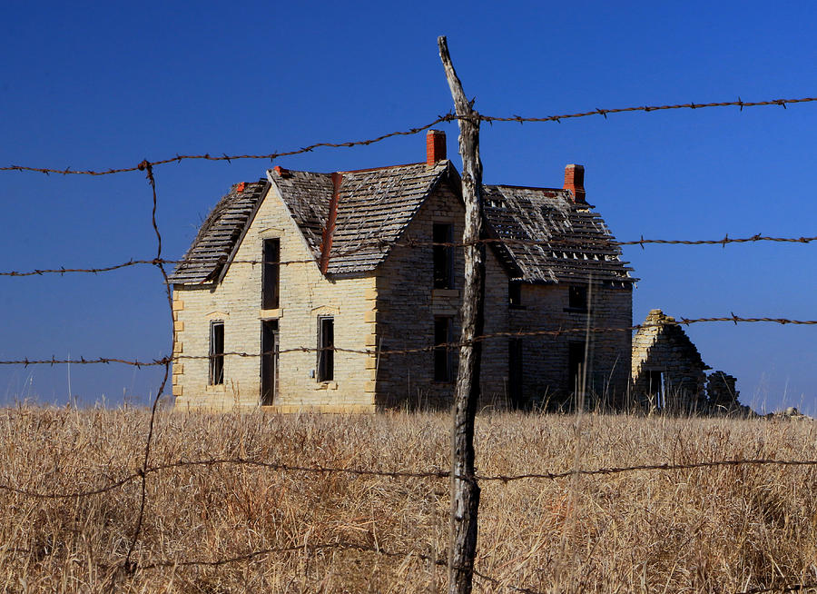 Home Behind the Barbed Wire Photograph by Christopher McKenzie
