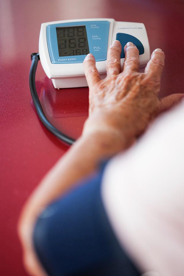 Home Blood Pressure Testing Photograph by Cristina Pedrazzini/science Photo Library