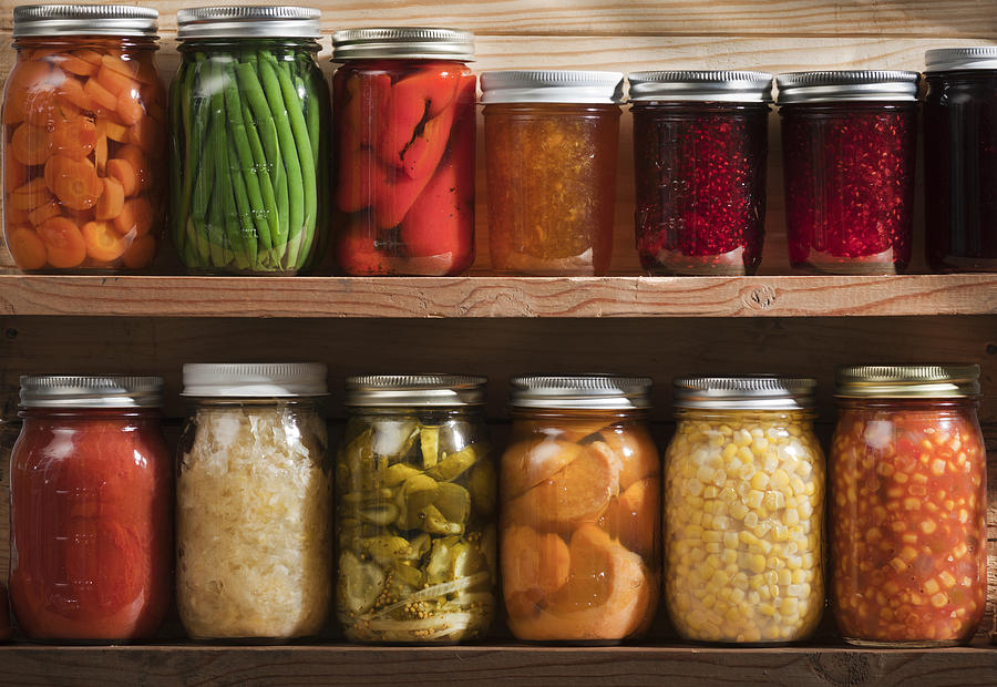 Home Canning, Preserving, Pickling Food Stored on Wooden Storage Shelves Photograph by YinYang