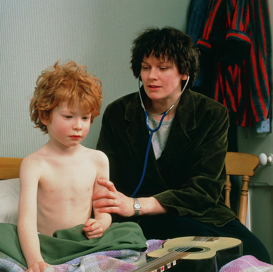 home-doctor-examines-child-with-failure-to-thrive-photograph-by-chris