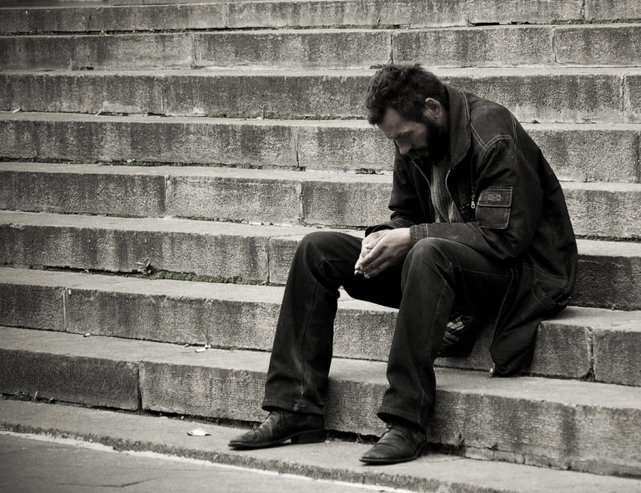 Homeless man sitting on steps in Kiev, Ukraine Photograph by Hans Neleman
