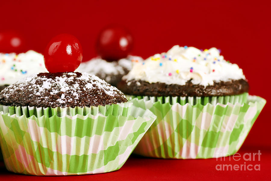 Cake Photograph - Homemade chocolate cupcakes on red by Sylvie Bouchard
