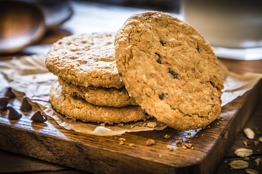 Homemade oatmeal cookies with chocolate chips Photograph by Carlosgaw