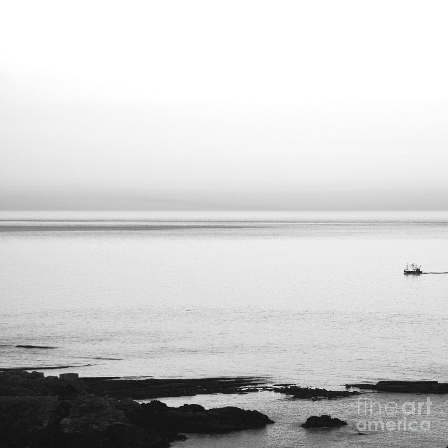 Homeward bound in calm seas black and white Photograph by Paul Davenport