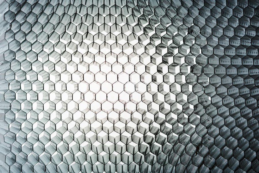 Honeycomb panel close-up, abstract texture with light Photograph by Marcoventuriniautieri