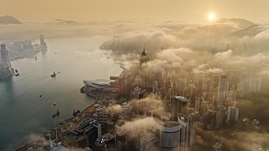 Hong Kong from air at sun rise Photograph by MediaProduction