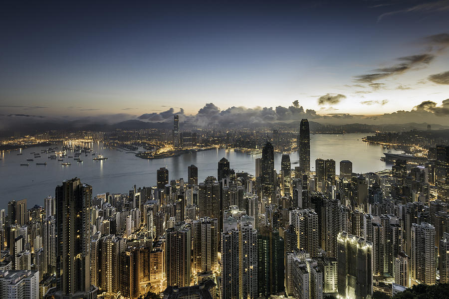 Hong Kong skyline at sunrise Photograph by Martin Puddy