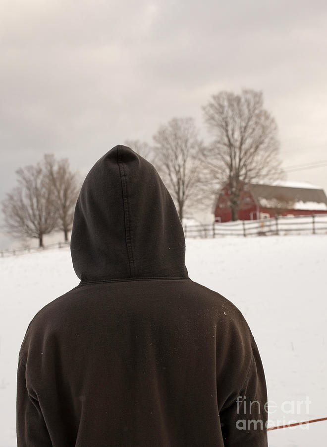 Hooded boy at farm in winter Photograph by Edward Fielding