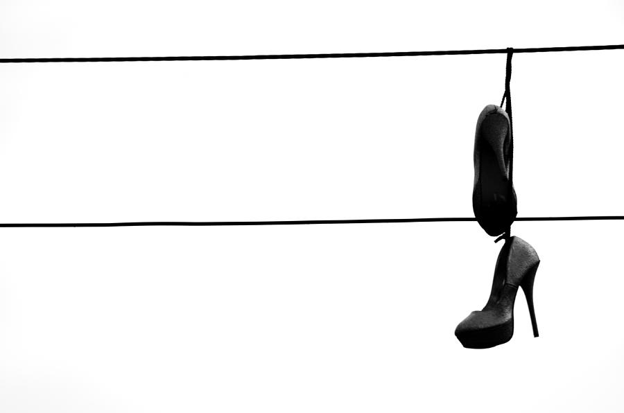 Shoes On The Line Photograph - Hooked and Booked  by J C