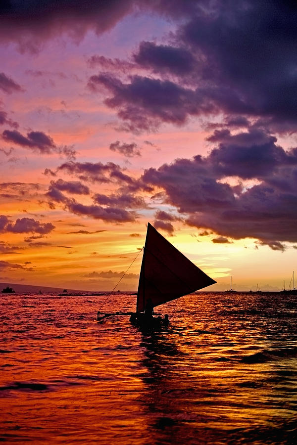 Sunset Photograph - Hoolana - A sailing canoe on the water at sunset by Nature  Photographer
