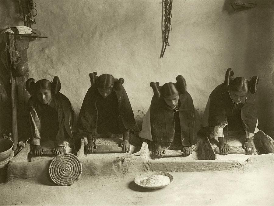 Hopi Women Grinding Grain Photograph by Library Of Congress