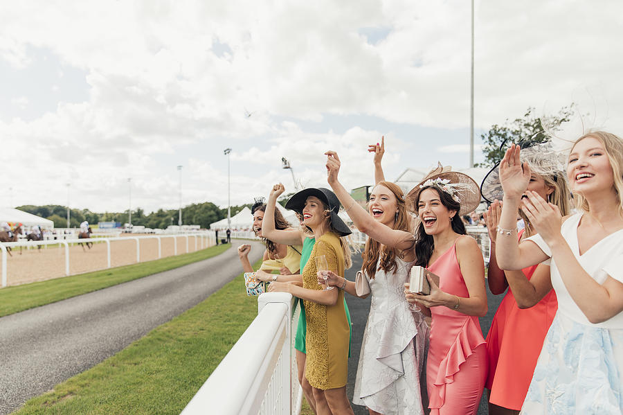 Horses Racing on Ladies Day Photograph by SolStock
