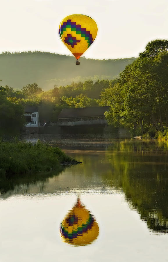 Hot Air Balloon Rises over Covered Bridge Photograph by John Vose
