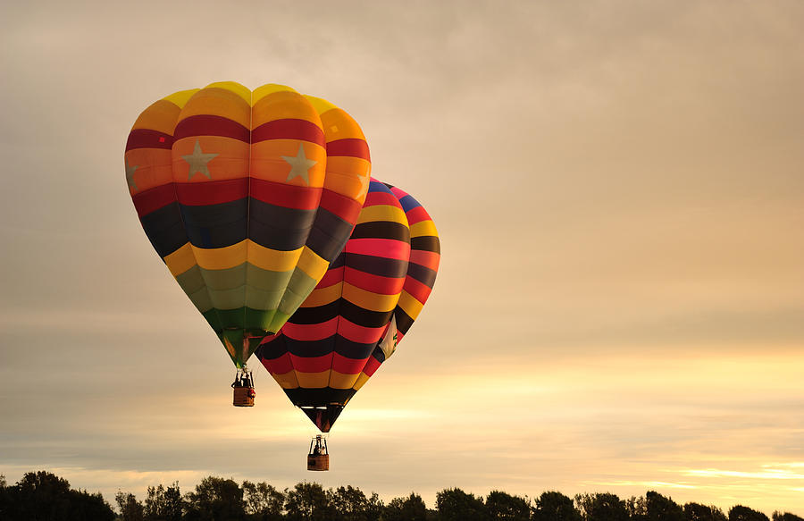 Hot Air Balloons Flying Photograph by Nadly Nudri - Fine Art America