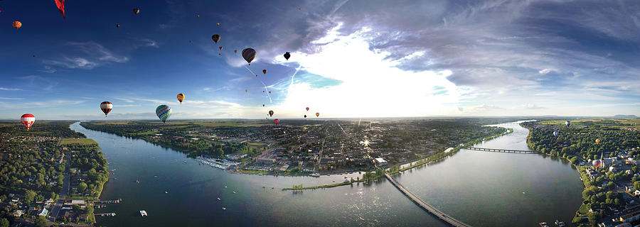Nature Photograph - Hot Air Balloons Flying Over A River by Panoramic Images