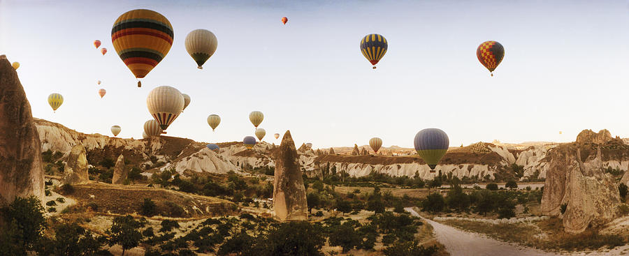 Transportation Photograph - Hot Air Balloons Over Landscape by Panoramic Images