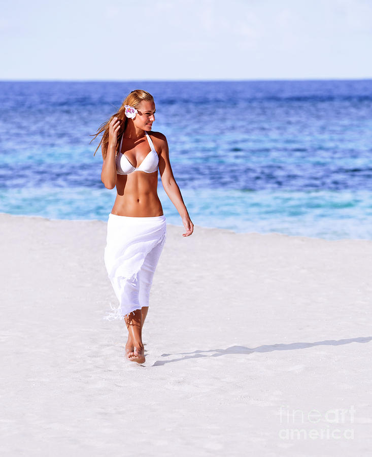 Hot girl walking on the beach Photograph by Anna Om