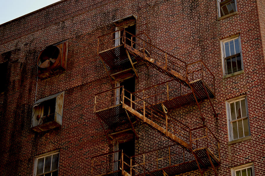Hotel Grim Fire Escape Photograph by Joel Wright
