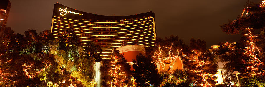 Las Vegas Photograph - Hotel Lit Up At Night, Wynn Las Vegas by Panoramic Images