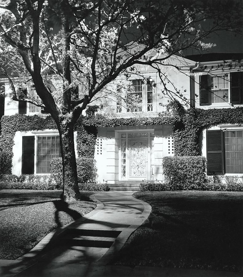 House And Garden At Night Photograph by William Grigsby