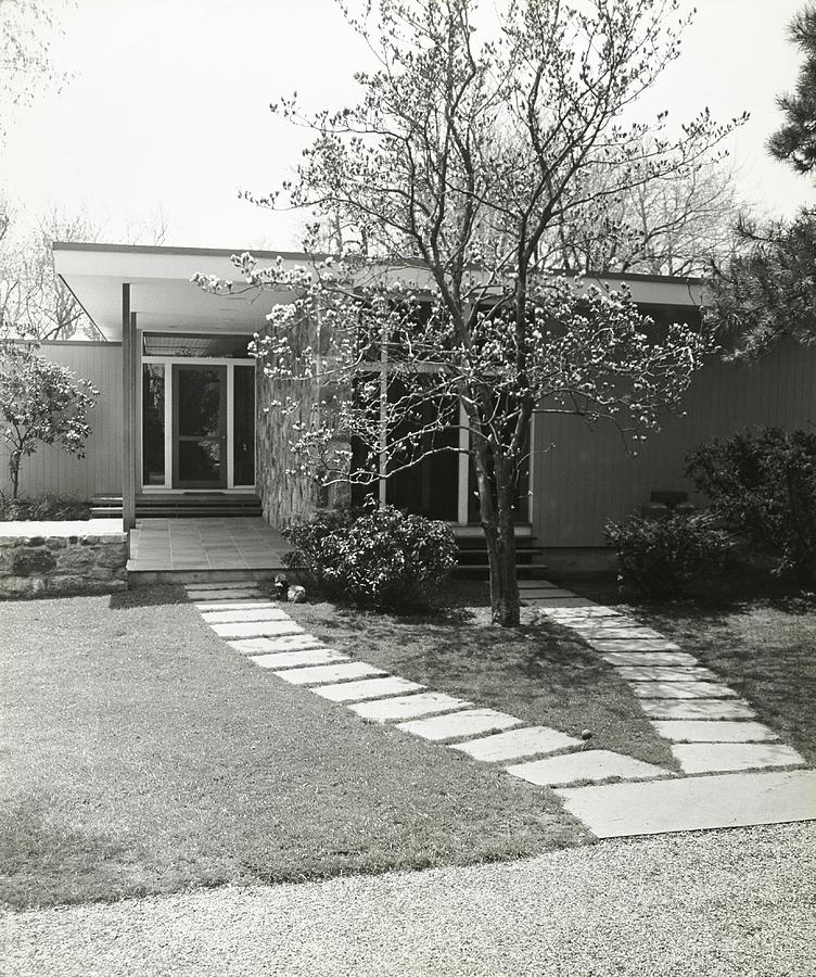 House And Garden Exterior Photograph by Ralph Bailey