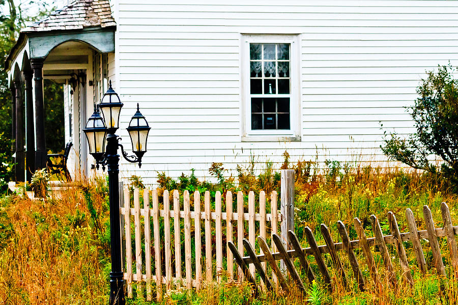 House with Fence and Lamp Photograph by Ben Graham