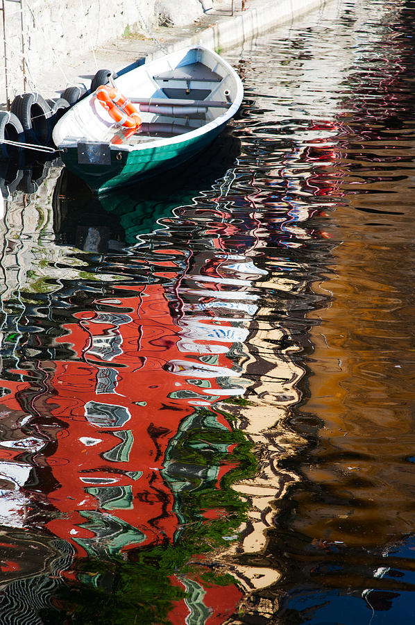 Transportation Photograph - Houses And Boat Reflected In Lake Como by Panoramic Images