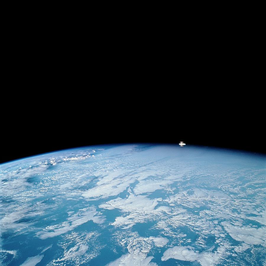 Hubble Space Telescope Over Earth Photograph by Nasa/science Photo Library