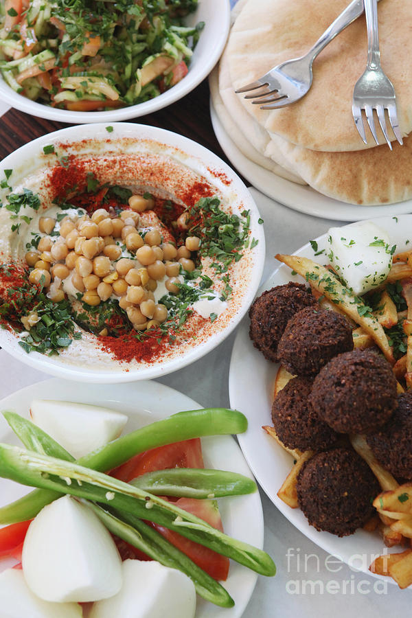 Hummus and falafel Photograph by Oren Shalev - Fine Art America