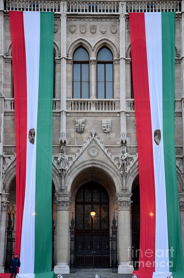Hungary flag hanging at Parliament Budapest Photograph by Imran Ahmed