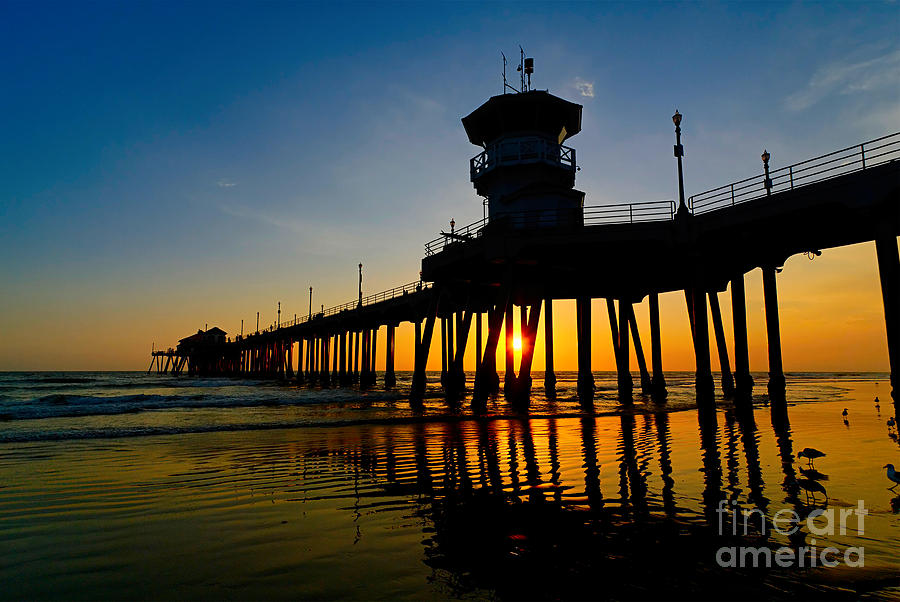 Huntington Beach Pier at sunset Photograph by Jamie Pham