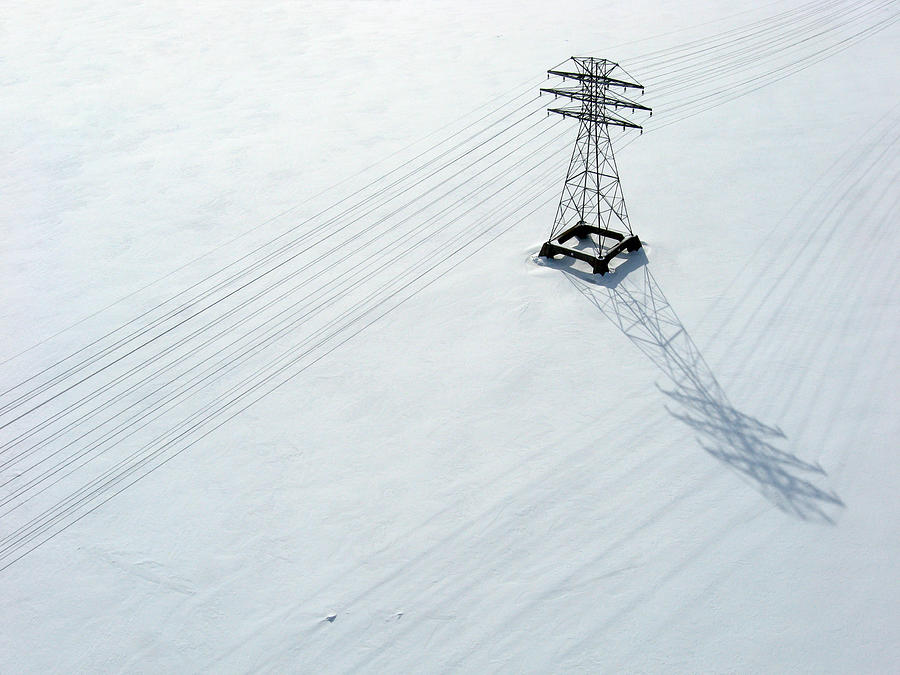 Abstract Photograph - Hydro lines over a frozen Ottawa River. by Rob Huntley