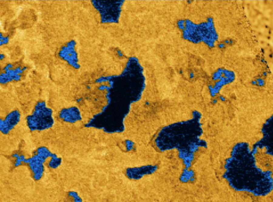 Hydrocarbon Lakes On Titan Photograph by Nasa/jpl/science Photo Library