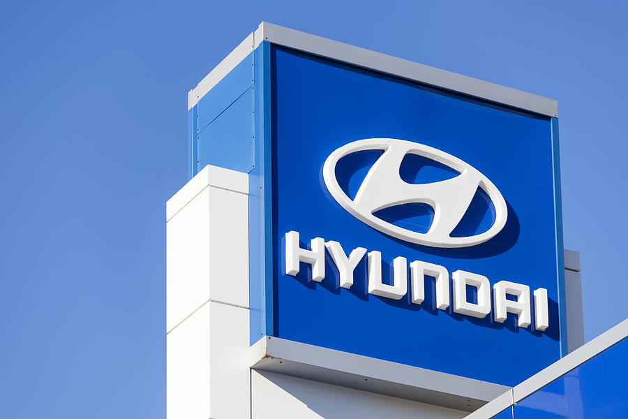 Hyundai Sign at Car Dealership Photograph by Tomeng