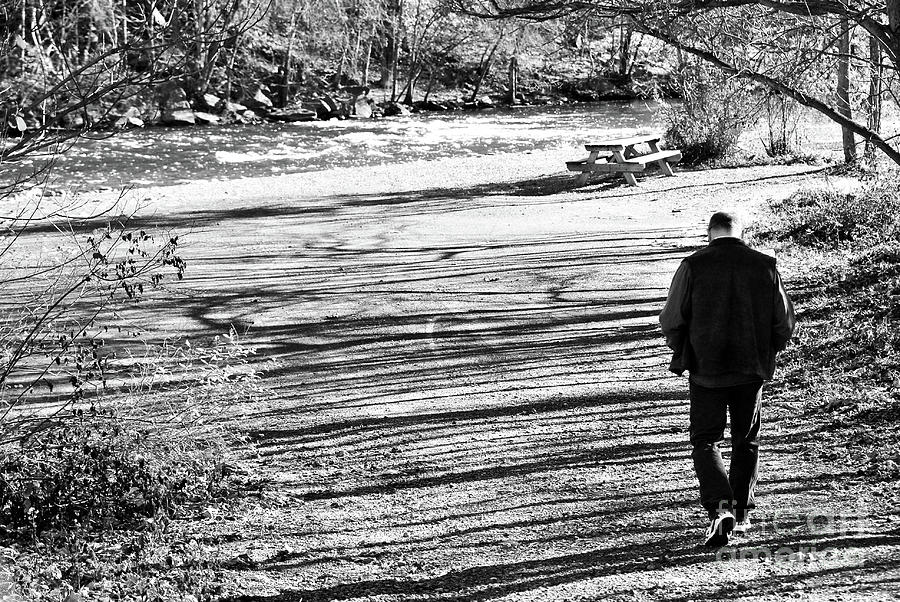 I Walk Alone Photograph by Lori Tambakis