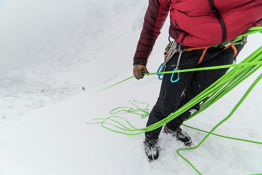 Ice Climber Belaying Partner Up To Belay Photograph by Joe Klementovich ...