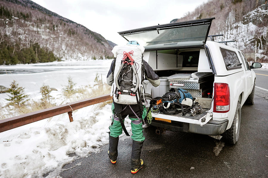 Ice Climber Preparing To Climb Photograph by The Open Road Images ...