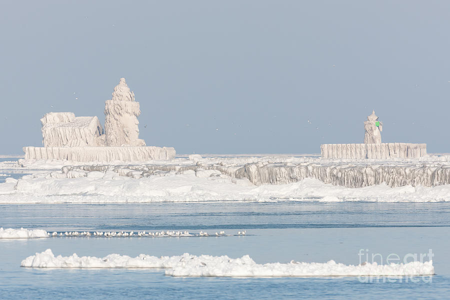 Ice Covered Cleveland Harbor Lighthouses Photograph by Clarence Holmes