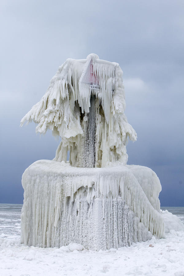 Ice Covered Warning Tower along Lake Michigan in St. Joseph Michigan Photograph by Peter Ciro